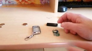 Замена батарейки в брелке от сигнализации SOBR GSM 130.