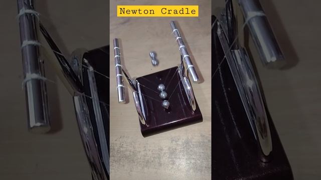 Newton Cradle - Beautiful Explanation of Conservation of momentum & Conservation of Energy | #Short