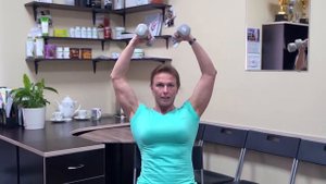 Разведение рук с гантелями Ларри Скотта, сидя