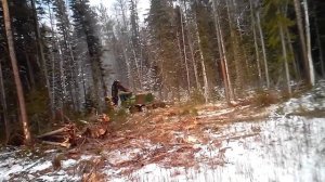 Валка леса john deere