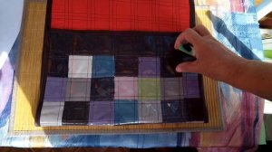 Папка для документов из прозрачной клеёнки и квадратиков из портьерной ткани.