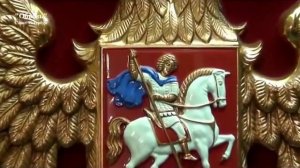 Герб Российской Федерации  в раме со стразами.