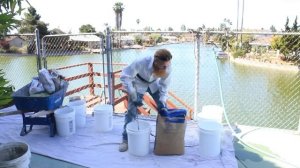 Mixing Structo-lite plaster in plastic buckets