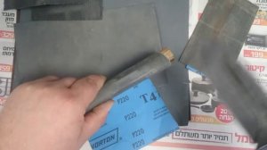 Заточка ножа на наждачной бумаге.