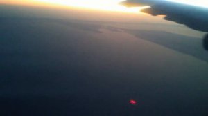 вид из окна самолета над Индийским океаном