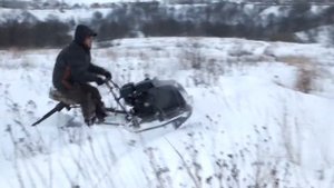 Мотобуксировщик Тофалар по мокрому снегу