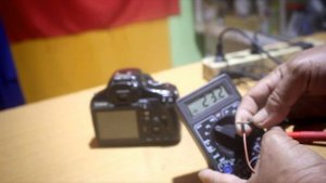 fix battery Camera Canon EOS 1100D (LP-E10) does not want charger