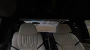 Чёрный минивэн Chevrolet Express с салоном VIP и перегородкой.