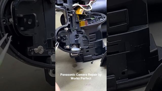 Panasonic camera repaired by Works Perfect ￼- DMC-FX300 faulty zoom toggle gets stuck