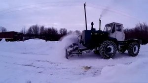 Уборка снега трактором ХТЗ Т-150К