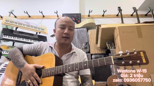 Đàn guitar Westone W-15 japan. Giá: 2 triệu ( test guitar Westone W-15 japan ) 0936057750