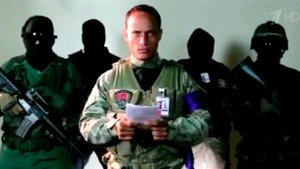 Полицейский, который организовал ряд нападений на ...здания в Каракасе, подозревается в связях с ЦРУ