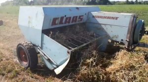 Работа пресс подборщика Claas markant 50 замедленная съемка вязального аппарата