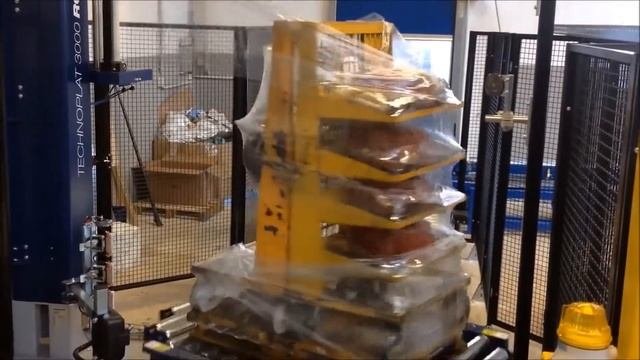 Упаковка паллет в стрейч-плёнку. Паллетообмотчик ROBOPAC с вращающимся столом.