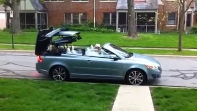 Stork & new Volvo C70 convertible 2