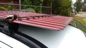 Как перевести профнастил на машине к месту установки?