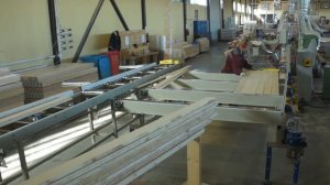 Линия по производству и упаковки погонажных изделий.