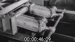 Сборка трактора ТДТ-40М на конвейере Онежского тракторного завода.