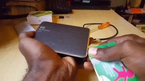 How to disassemble a  Western Digital My Passport external Hard drive easily