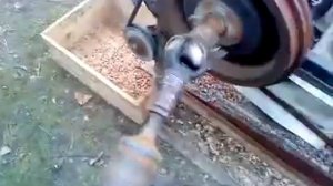 Самодельный комбайн для переработки кедровой шишки.