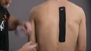 Кинезио тейпирование средней части спины.