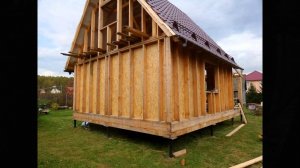 ч.8 Каркасный дом 6 на 6 своими руками  (установка конька, снегозадержателей, обшивка ОСП (OSB))