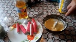 Крабовые палочки в сырном кляре. Готовьте сразу побольше.