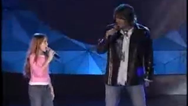 Billy Ray Cyrus and Miley Cyrus-Holding On To A Dream