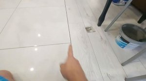 стык ламината и керамогранита !!! продавили ламинал ???