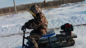 Самодельный детский снегоход со снегоката с двигателем от триммера.