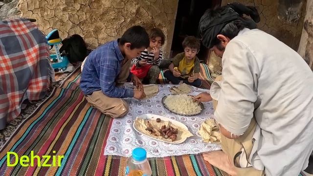 The high spirits of the nomadic family: finishing the hut with cement and love