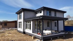 Каркасный дом 15х16м. с навесом под автомобиль.