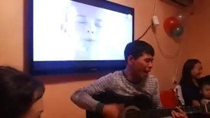 Черный Аман на гитаре