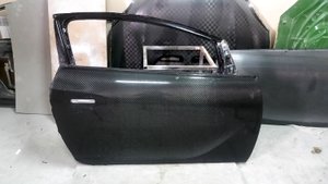 Карбоновые двери Opel Astra J