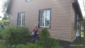 Фото видео отчёт Монтаж сайдинга Альта Профиль под орех)