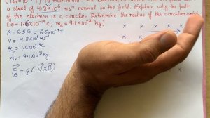 In a chamber, a uniform magnetic field of 6.5 G ( 1G = 10-4 T) is maintained. An electron is short