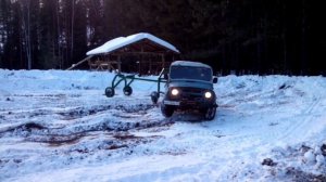 Телега для добычи и перевозки леса и УАЗ