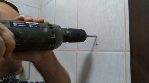 Как повесить крючки в ванной ?