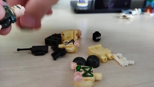 открывают пакетики с Лего минифигурками 16 часть Конец смотреть онлайн