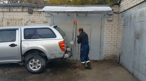 Силовой многофункциональный козырек над гаражными воротами