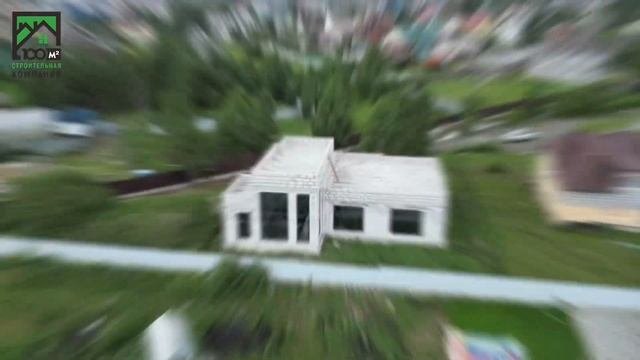 Дом с плоской крышей и панорамными окнами по проекту строительной компании 100м2