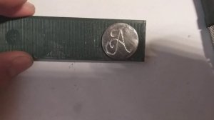 Простейшая гравировка на монете.