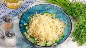 Салат с яйцом, огурцом, зелёным луком и сыром