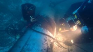 Подводная электродуговая сварка. Ремонт трубопровода.