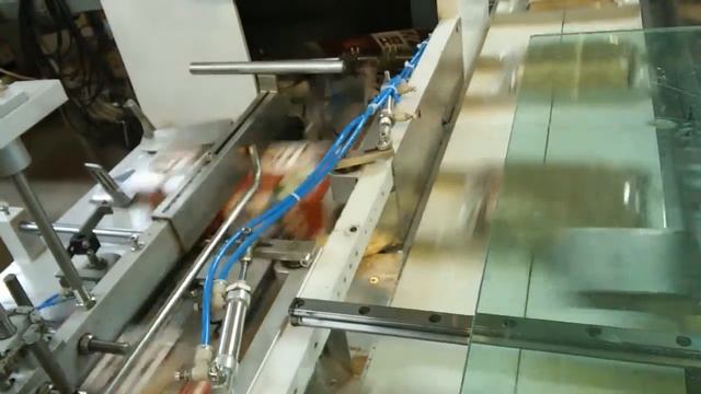 Автоматический укладчик в картонные коробки
