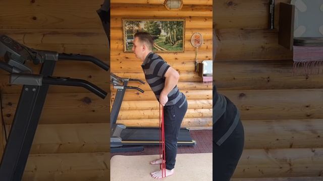 Упражнение от дряблости рук с резиновым эспандером