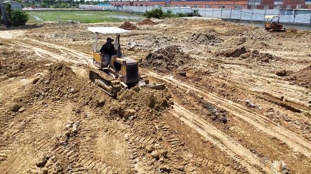 Строительство, ровняем площадку