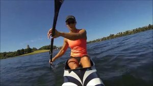 Lisa Carrington paddling with Vaaka
