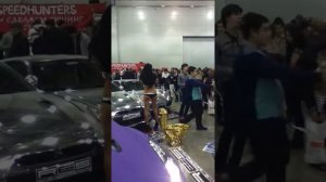 Moscow Tuning Show (парень играет на саксофоне)