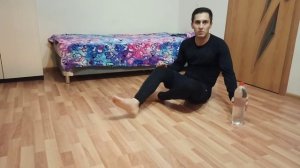 Упражнение с бутылкой для спины